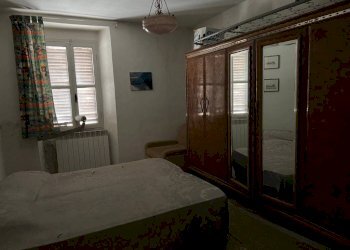 Camera da letto - Bilocale via Vittorio Emanuele I I, 14, Serina - foto 12