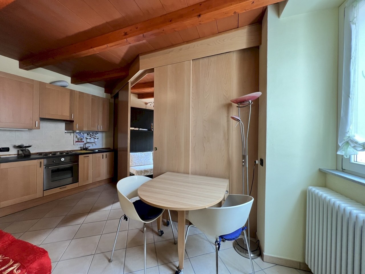 zona pranzo - Appartamento Piazza Marchetti 12, Laveno-Mombello - foto 2