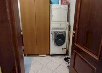 Stanza arredata - Trilocale via Roma, Rolo - foto 12