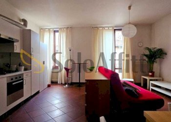 Sala con angolo cottura - Bilocale Forlì - foto 1