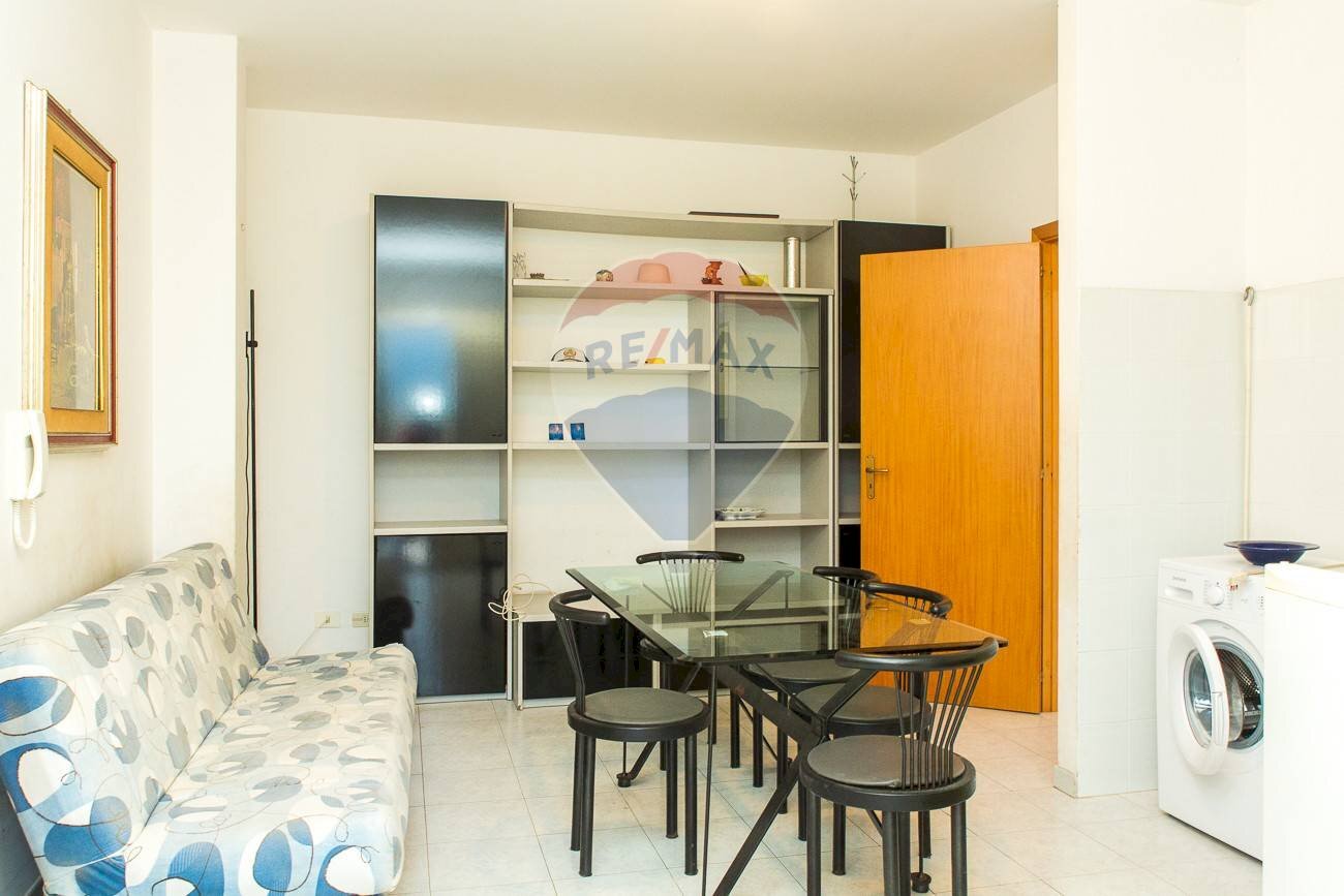 Sala da pranzo - Trilocale Via Dott Mario Amato
 
38, Mascali - foto 2