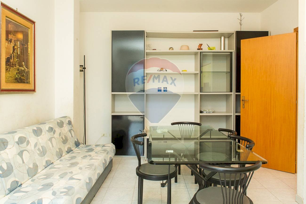 Sala da pranzo - Trilocale Via Dott Mario Amato
 
38, Mascali - foto 3