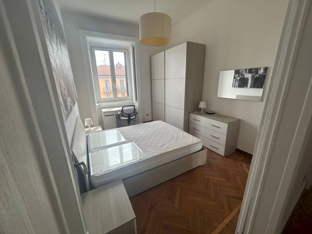 Camera da letto - Quadrilocale via Spartaco, 38, Milano - foto 1