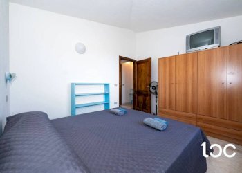 Camera da letto - Villa a Schiera San Teodoro - foto 11