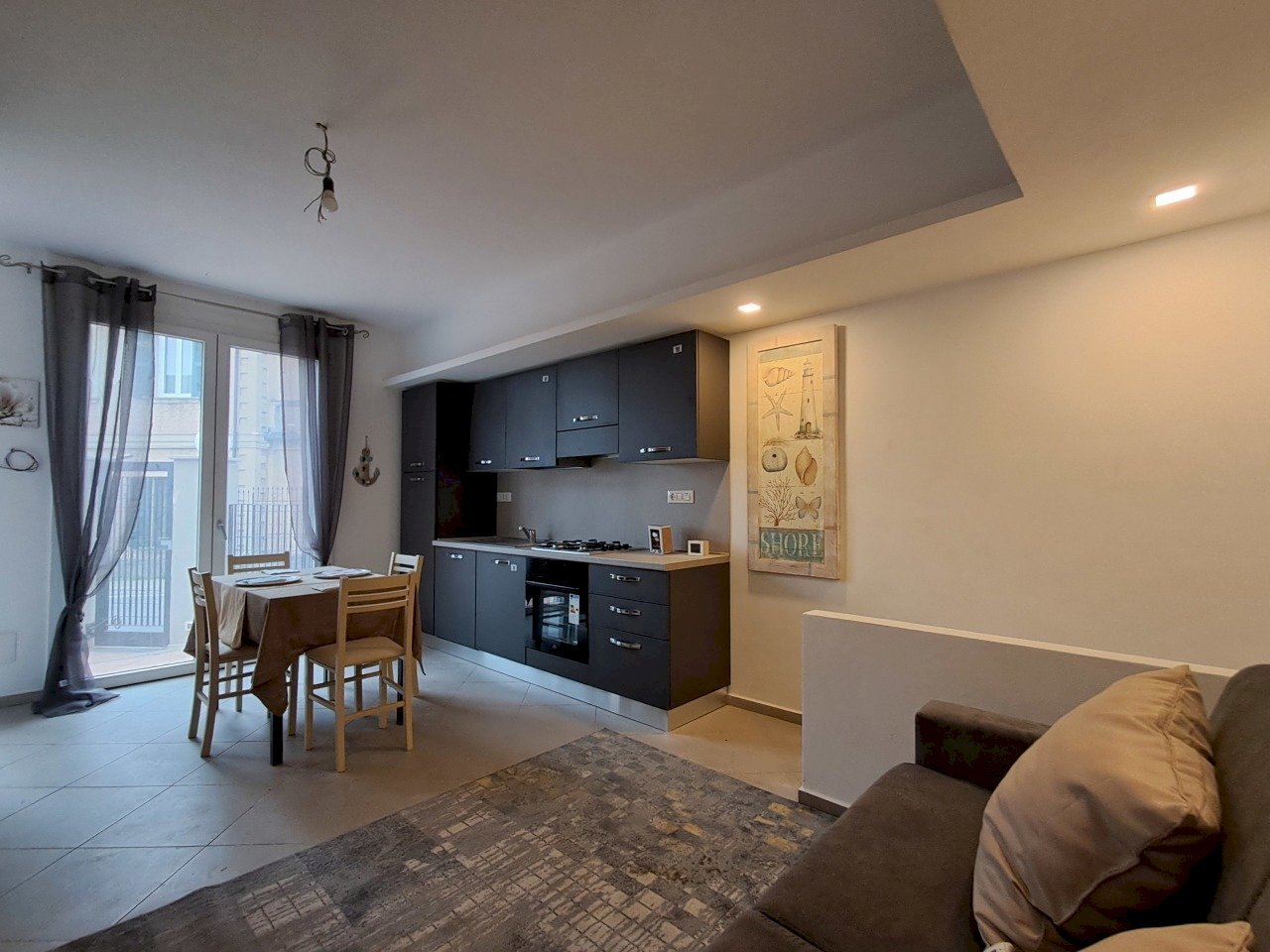 soggiorno angolo cottura - Bilocale Loano - foto 1