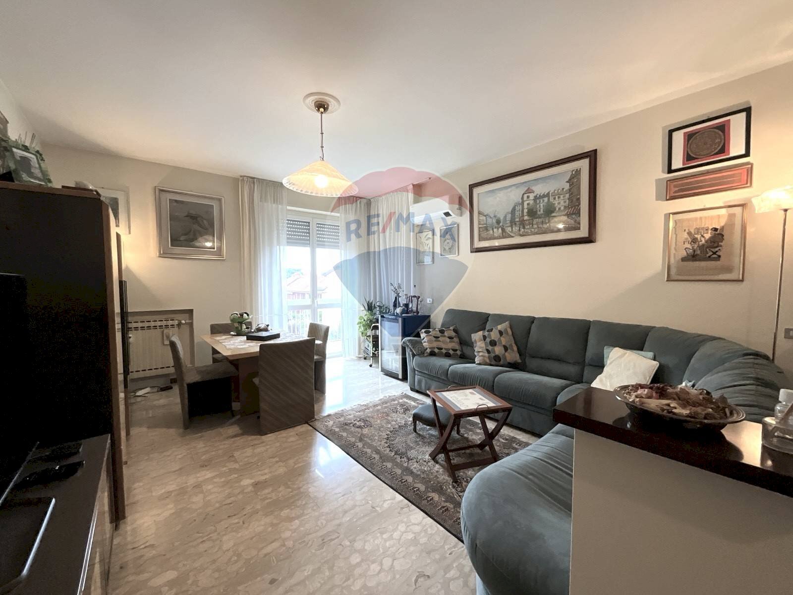 Soggiorno - Trilocale Via Mattei
 
64, Arese - foto 1