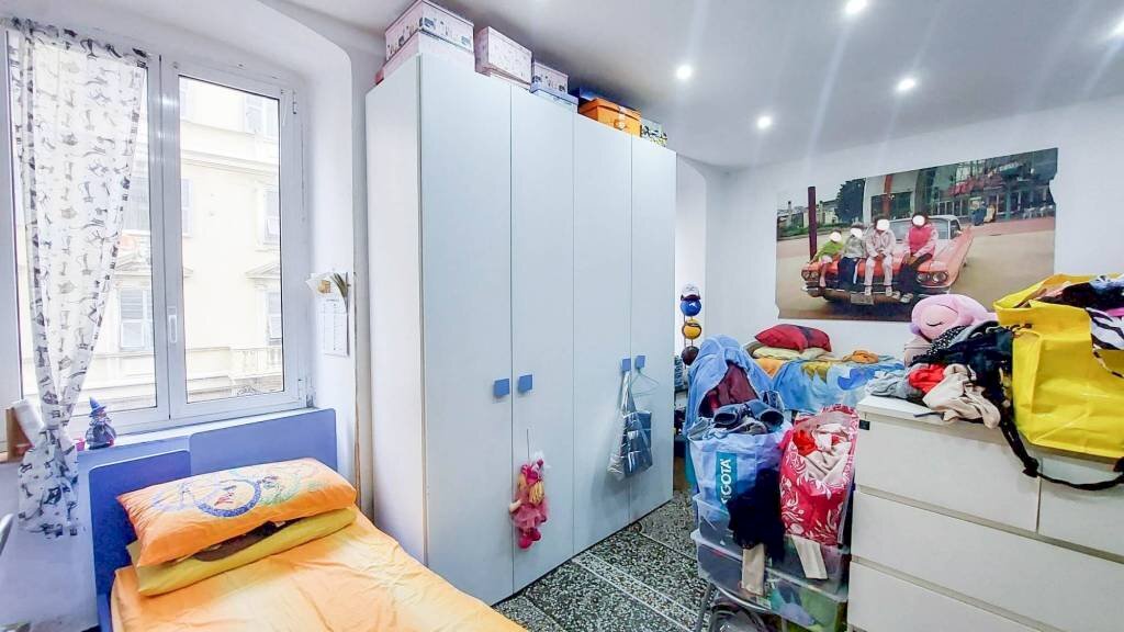 Camera da letto - Quadrilocale via Giovanni Torti, Genova (zona Marassi) - foto 3