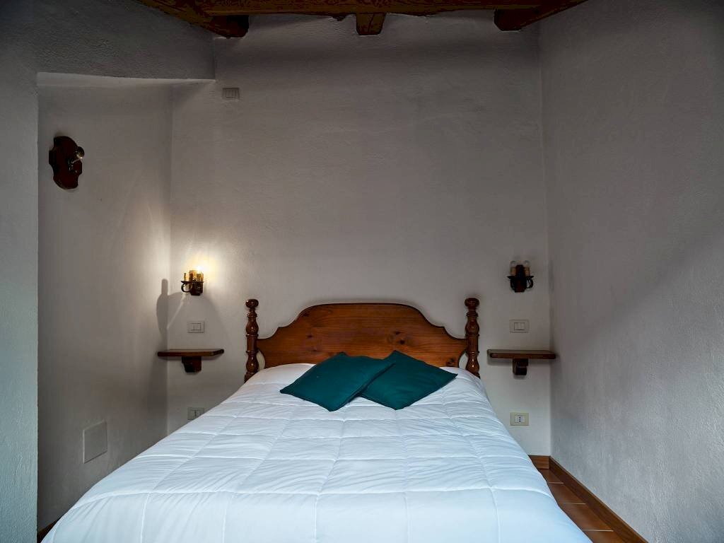 Camera da letto - Two-room apartment via Umberto I, 90, Fenestrelle - photo 3