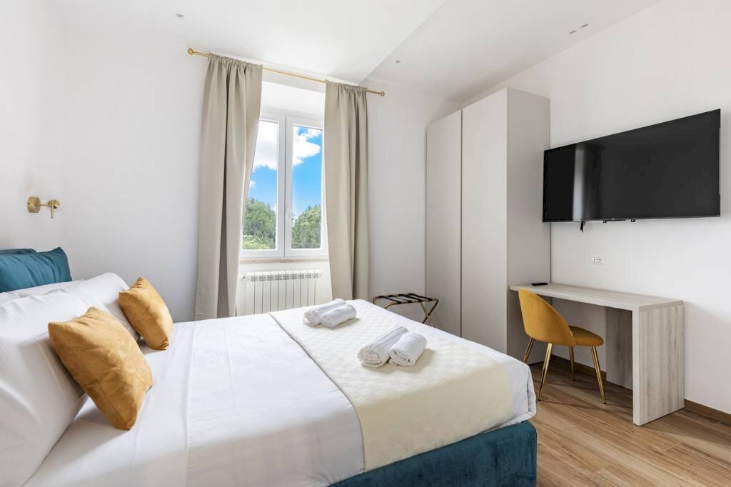 Camera da letto - Three-room apartment via Domenico Fontana, 40, Roma - photo 1