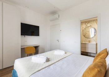 Camera da letto - Three-room apartment via Domenico Fontana, 40, Roma - photo 5