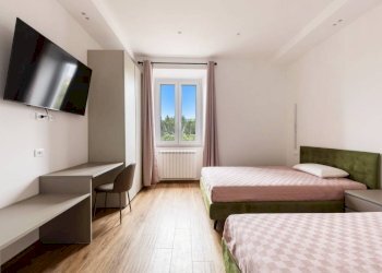 Camera da letto - Three-room apartment via Domenico Fontana, 40, Roma - photo 12