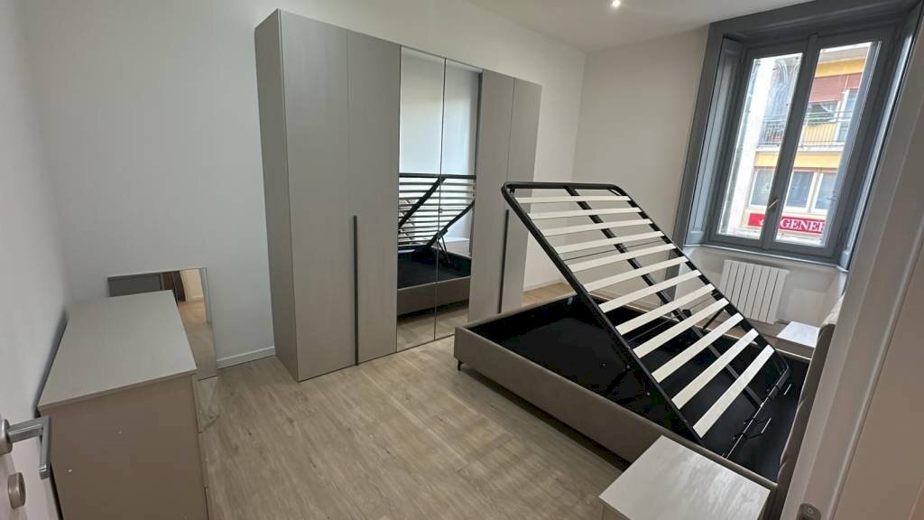 Camera da letto - Bilocale via Plinio, 4, Erba - foto 1