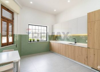 Cucina (rendering generato da IA) - Casa indipendente via Tenente Nicola Maugeri
 
5, Aci Sant'Antonio - foto 4