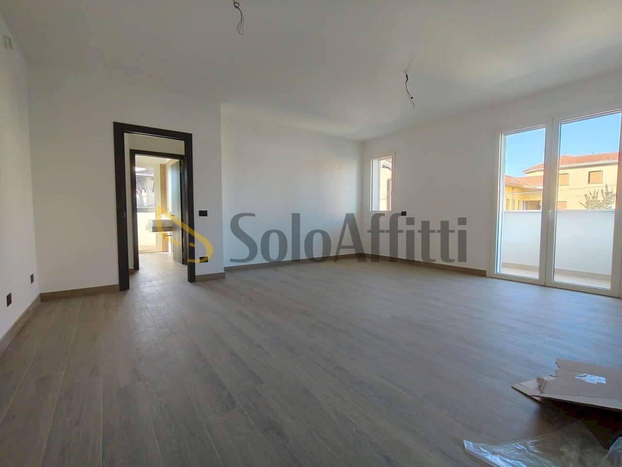 soggiorno con angolo cottura - Trilocale Magnago - foto 2