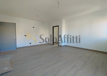 soggiorno con angolo cottura - Trilocale Magnago - foto 4