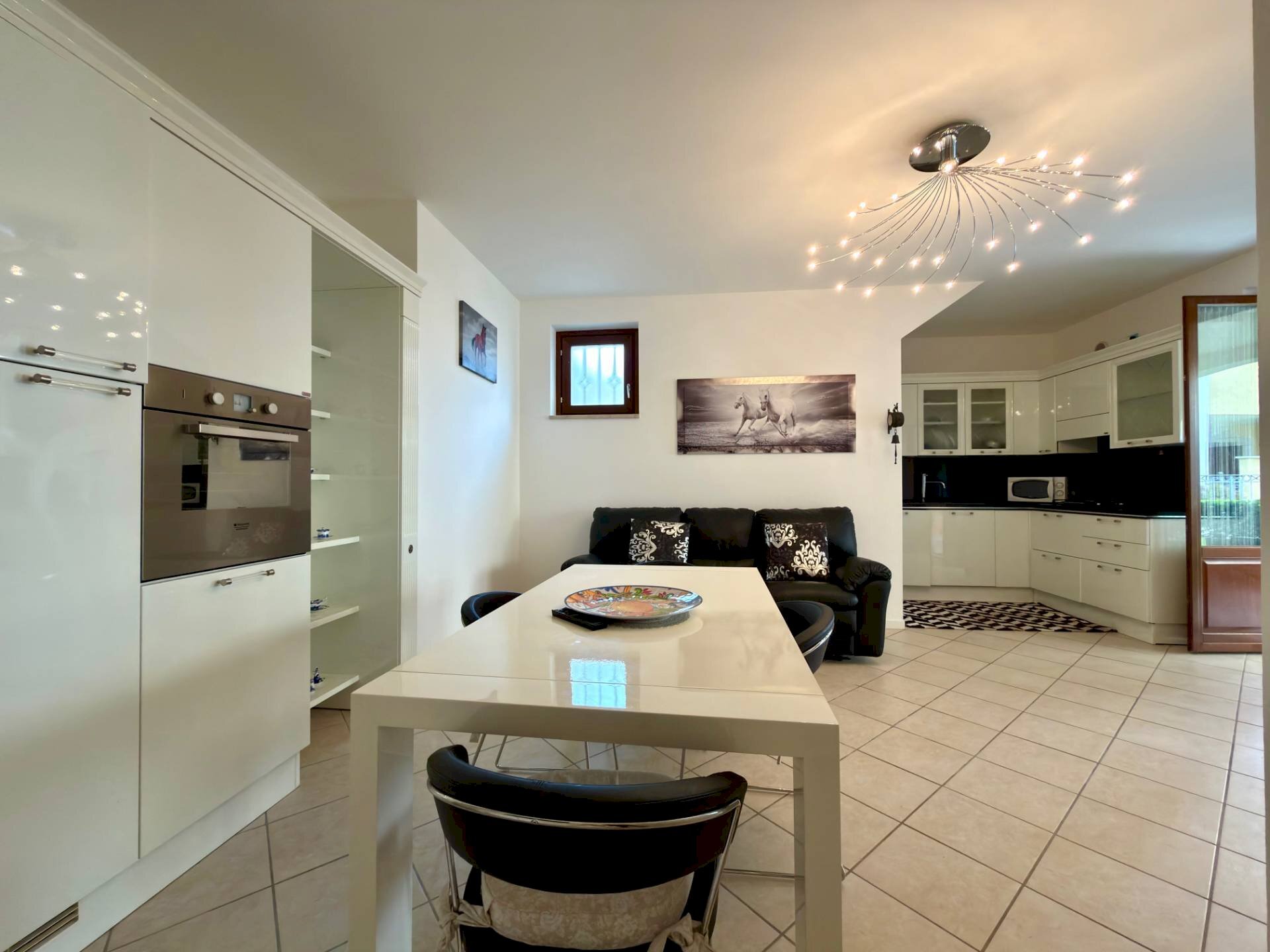 Soggiorno cottura - Trilocale Lungolago Giuseppe Zanardelli
36, Toscolano-Maderno - foto 3