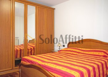 camera da letto - Trilocale Cabiate - foto 13