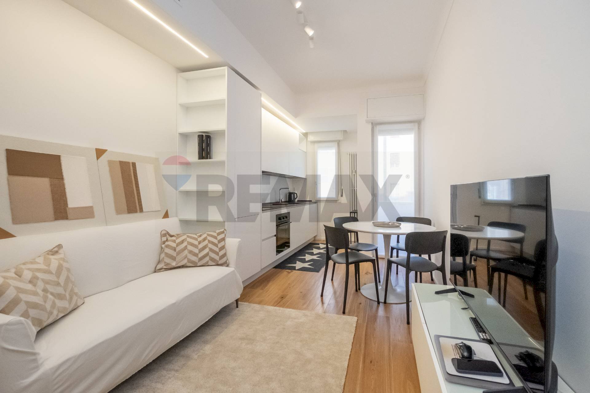 Soggiorno con cucina - Trilocale Milano - foto 1