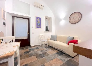 Soggiorno con angolo cottura - Trilocale Via dei Fori Imperiali, Roma - foto 6