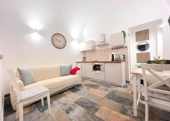 Soggiorno con angolo cottura - Trilocale Via dei Fori Imperiali, Roma - foto 8