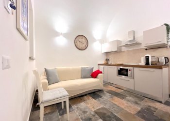 Soggiorno con angolo cottura - Trilocale Via dei Fori Imperiali, Roma - foto 9