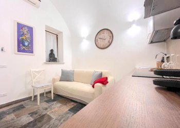 Soggiorno con angolo cottura - Trilocale Via dei Fori Imperiali, Roma - foto 10