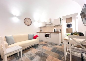 Soggiorno con angolo cottura - Trilocale Via dei Fori Imperiali, Roma - foto 11