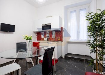 Zona living con angolo cottura - Trilocale Via Machiavelli 47, Roma - foto 13