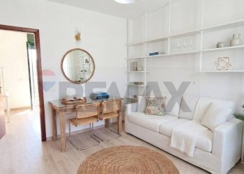 Soggiorno modificato con IA - Trilocale Via Francavilla
 
7, Taormina - foto 17