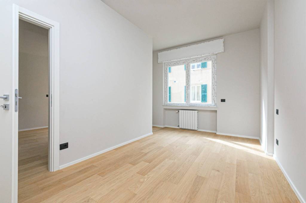 Camera da letto - Bilocale via Assarotti, 17A, Genova (zona Castelletto) - foto 1