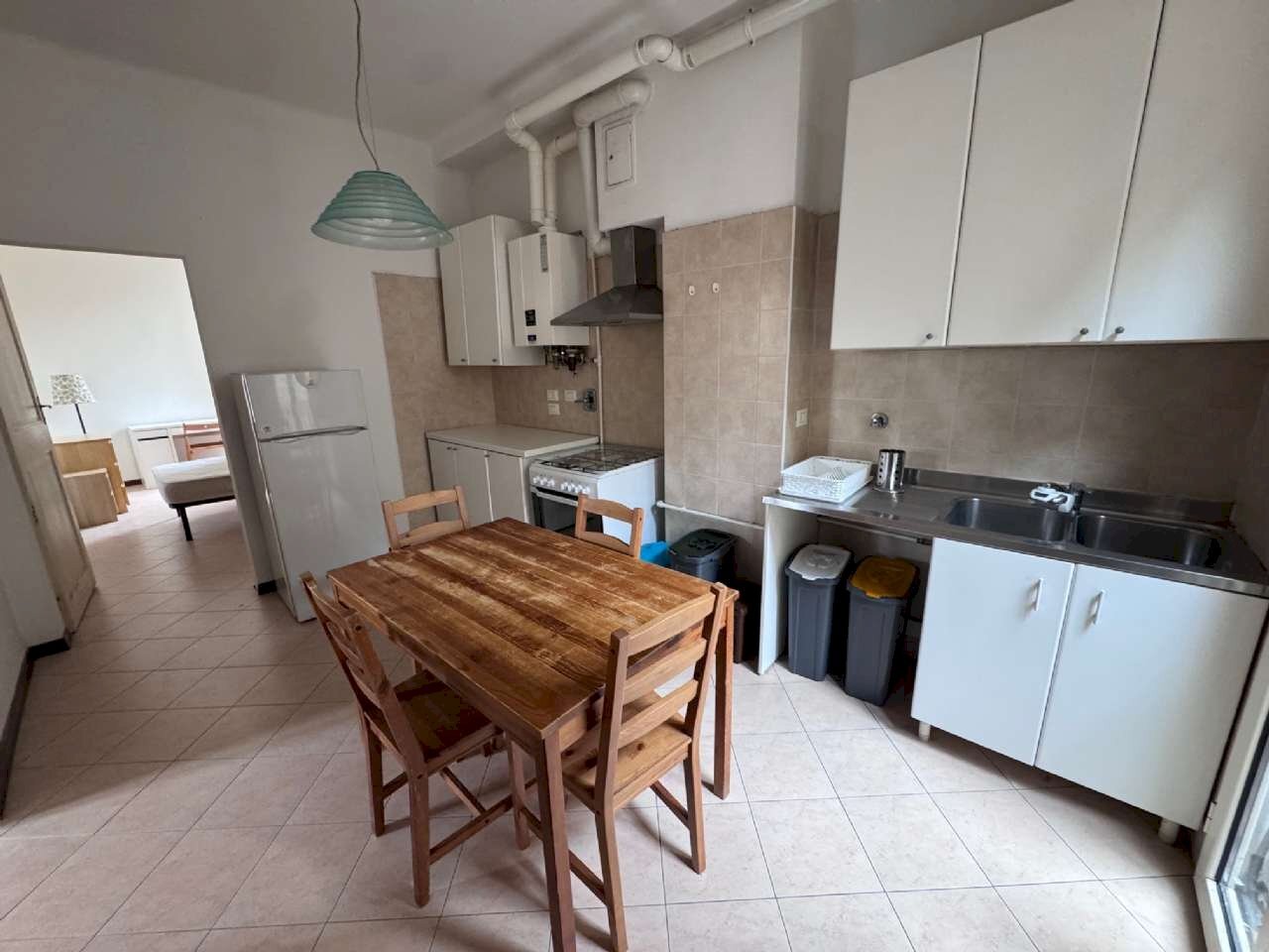 soggiorno - cucina a vista - Quadrilocale vicolo Malgrado, Bologna (zona Centro Storico) - foto 2