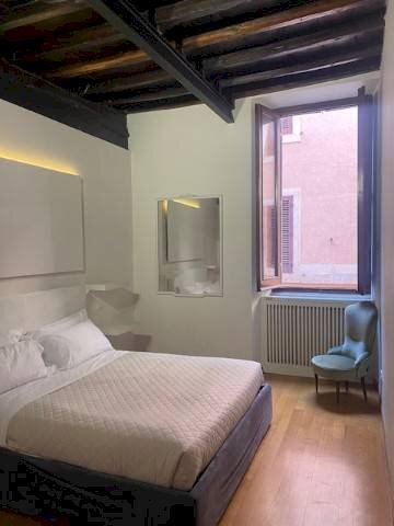 Camera da letto - Trilocale via dei Greci, Roma (zona Centro Storico) - foto 2