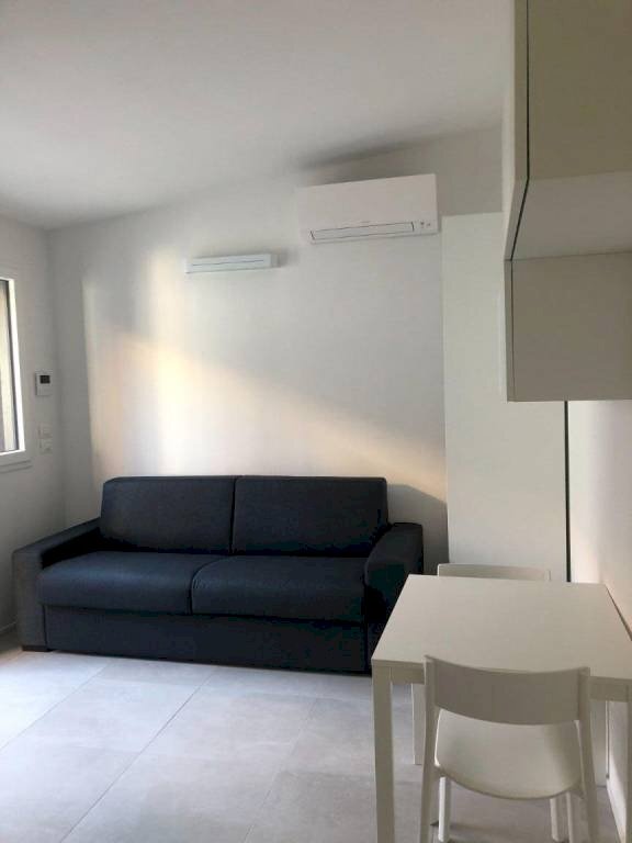 Soggiorno - Bilocale via Bartolomeo Passarotti, 3/4, Bologna (zona Bolognina) - foto 1