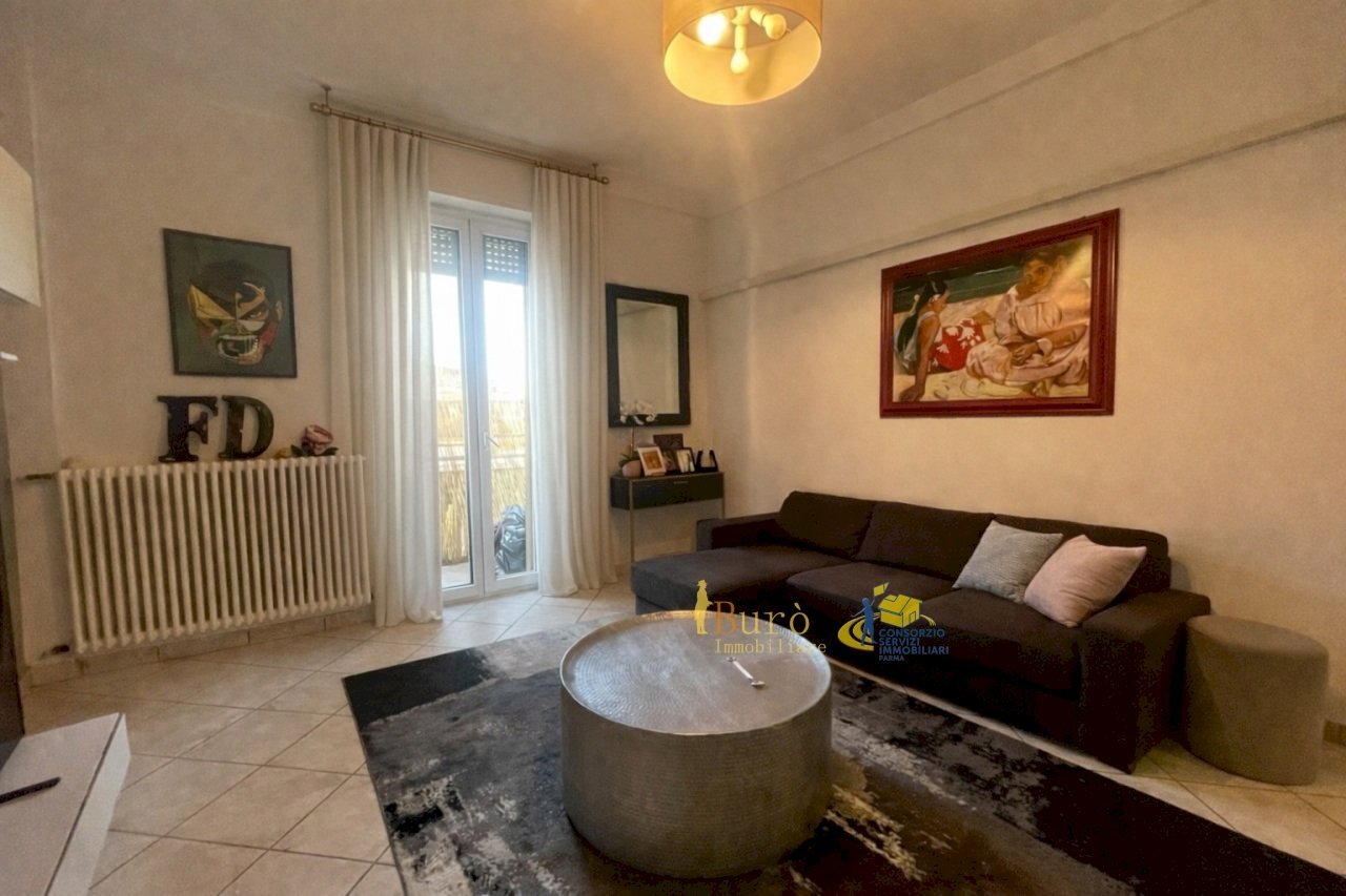 soggiorno vista 1.jpg - Trilocale Via M. Jacchia 4, Parma (zona Montanara) - foto 2