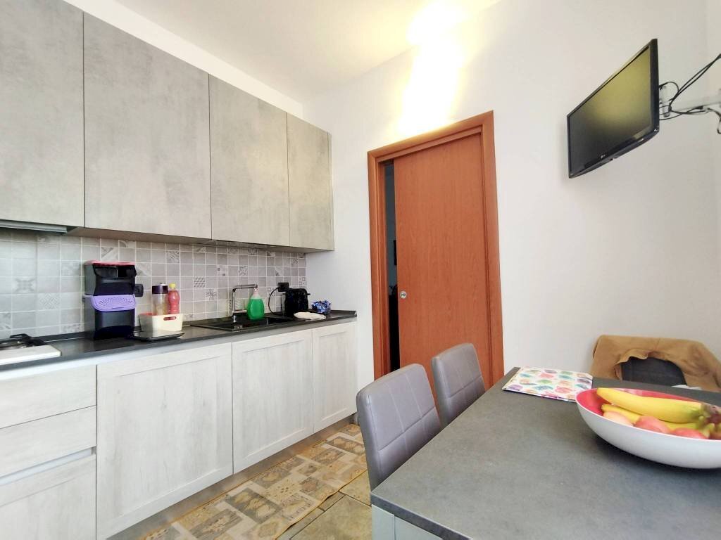 Cucina - Trilocale piazza della Republica, 7, Sedriano - foto 1