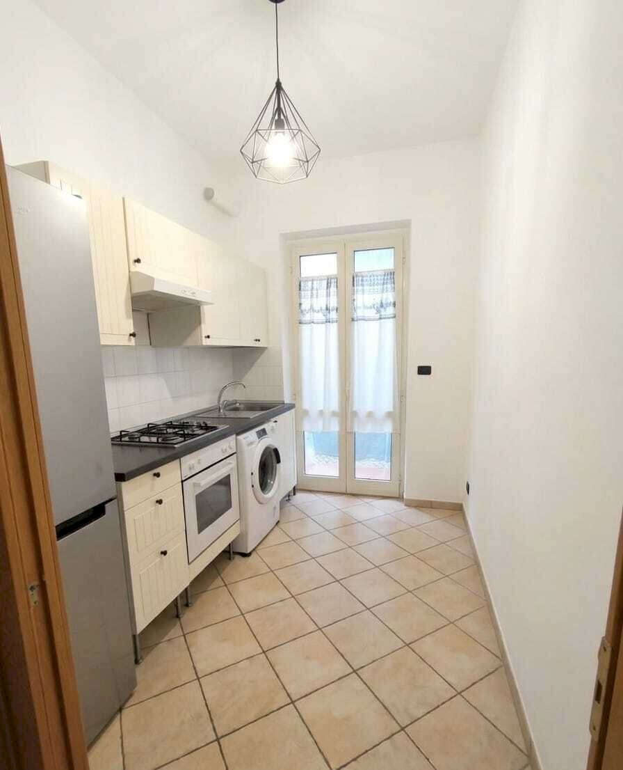 app 1 cucina.jpg - Appartamento Via Avegno, Roma - foto 2