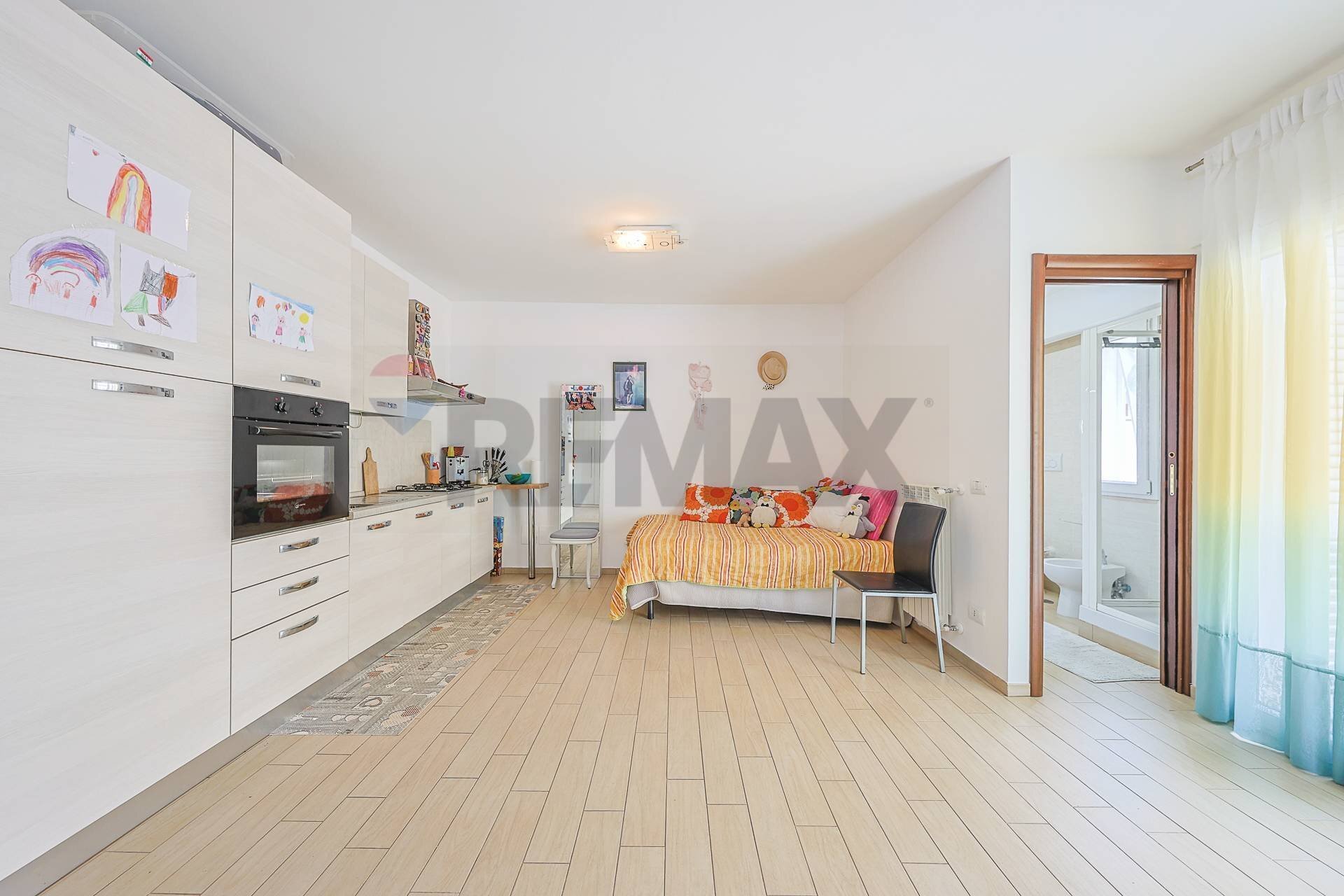 Soggiorno - Monolocale Via Giorgio Rodocanacchi, Fiumicino - foto 2