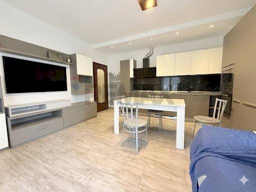 Sala da pranzo - Appartamento Porte di Rendena - foto 1