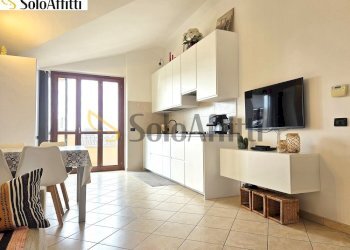 Soggiorno con cucina a vista - Trilocale Via Eugenio Montale 12, Limbiate - foto 7