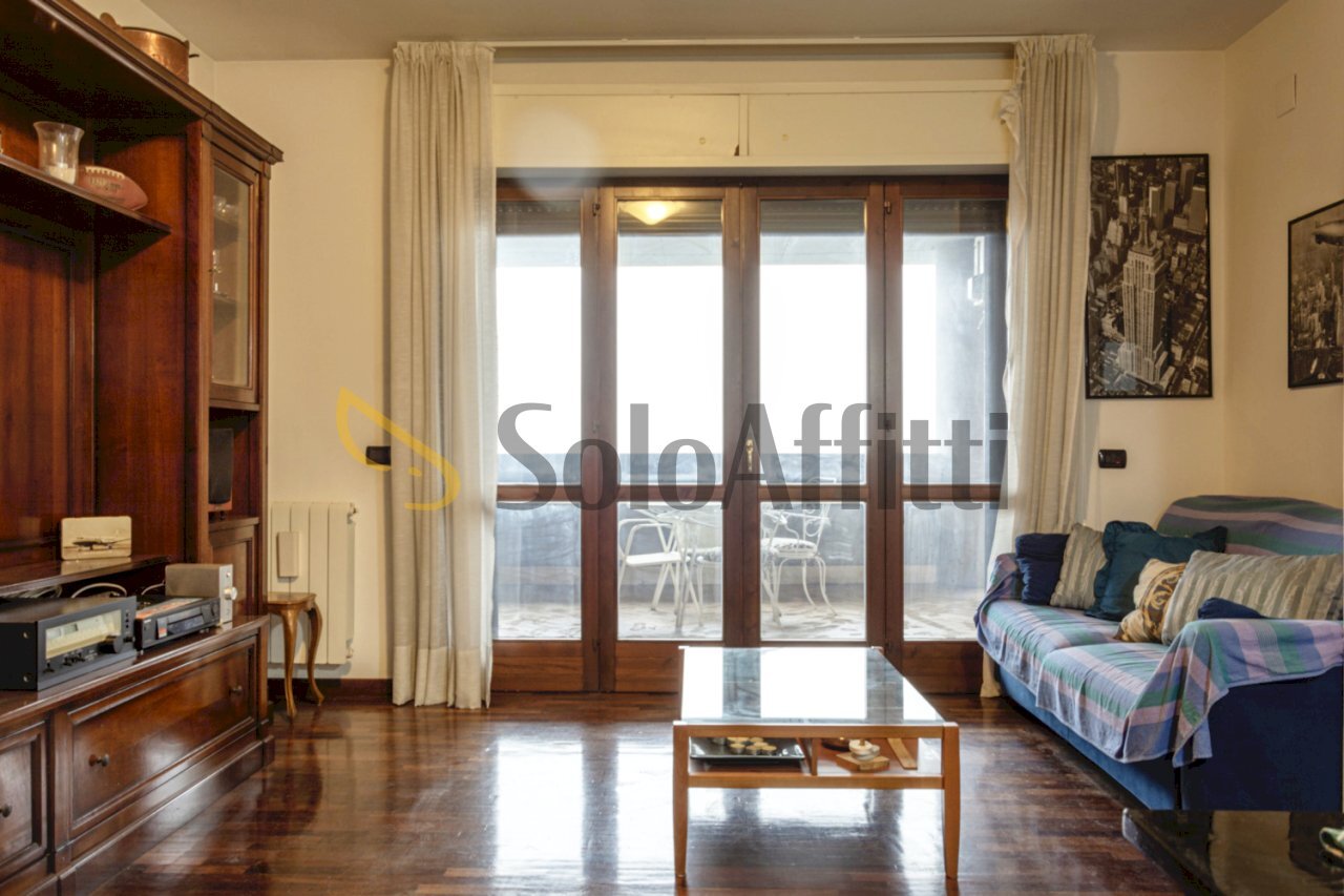 Via Copenaghen soggiorno_1.jpg - Trilocale Via Copenaghen, Fiumicino - foto 1