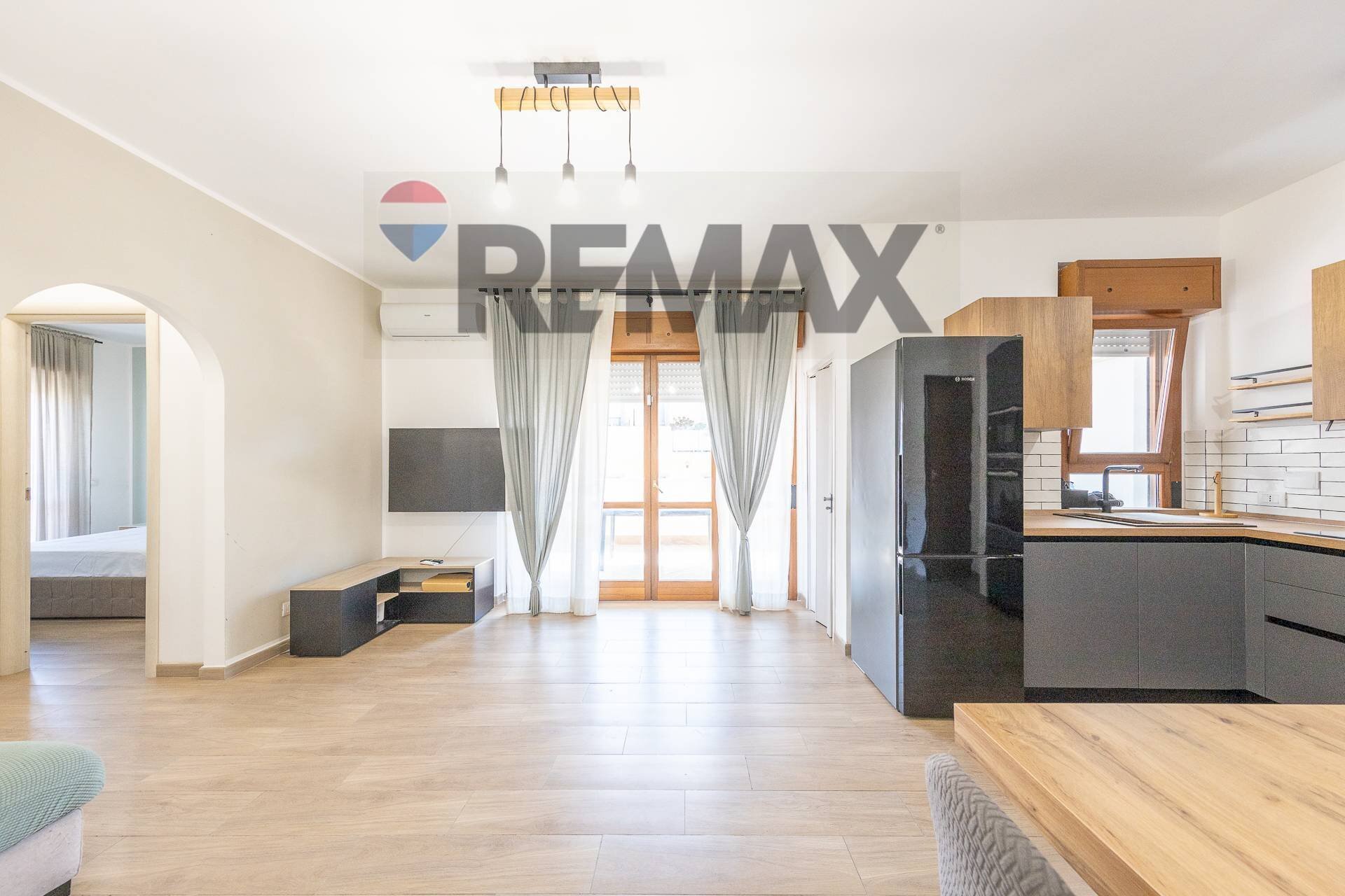 Soggiorno - Bilocale Via Giorgio Rodocanacchi, Fiumicino - foto 1