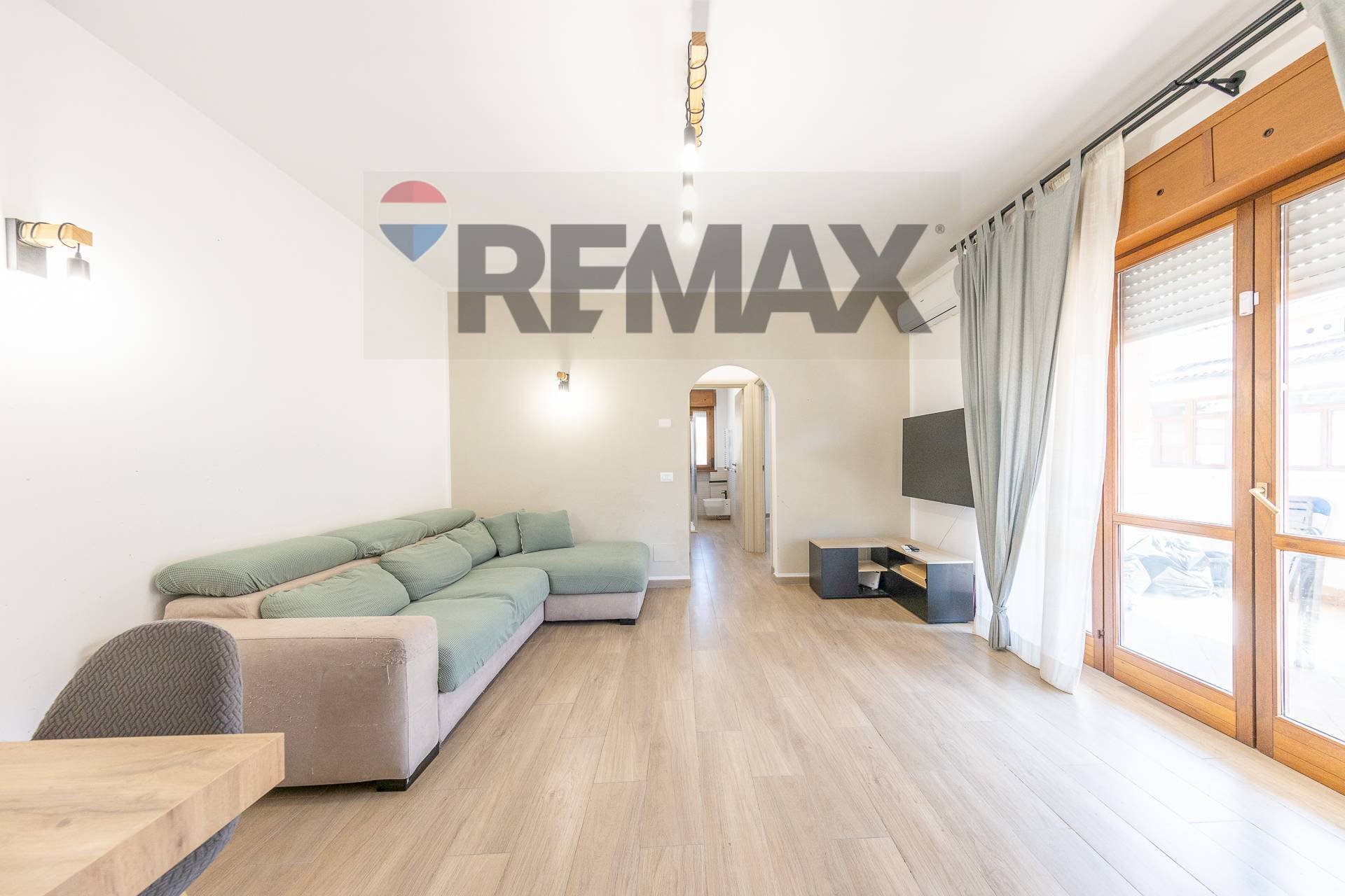 Soggiorno - Bilocale Via Giorgio Rodocanacchi, Fiumicino - foto 2