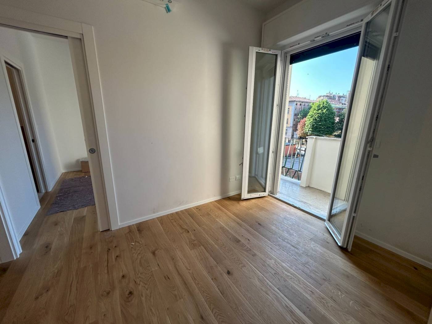 Camera da letto - Bilocale Via Don Giovanni Minzoni 4, Bologna (zona Marconi) - foto 1