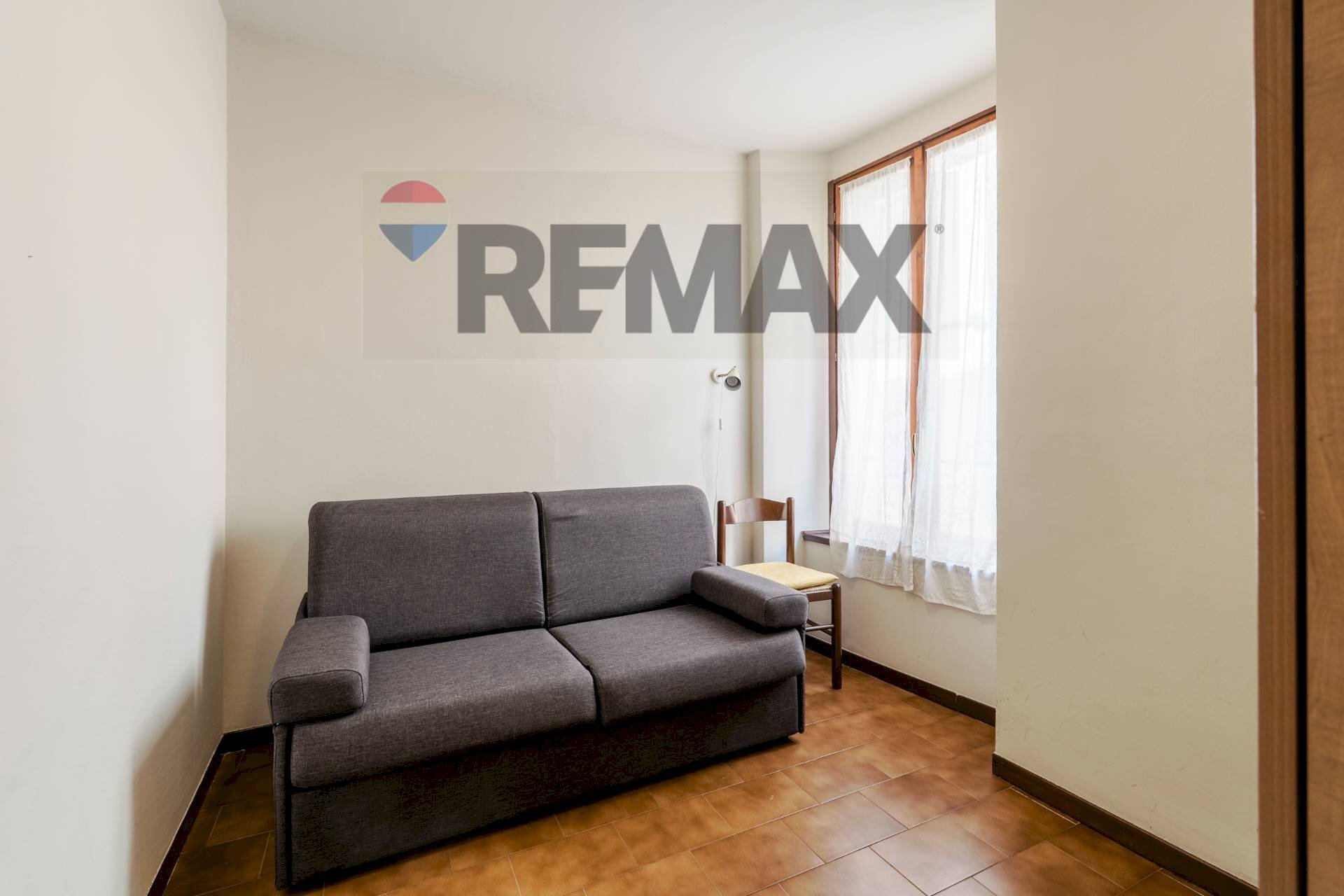 Soggiorno - Appartamento via Trento
 
54, Toscolano-Maderno - foto 2