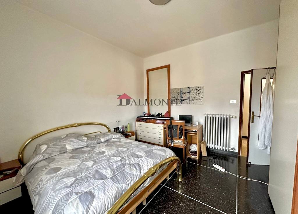 Camera da letto - Appartamento via Giovanni Bertini, Bologna (zona San Donato) - foto 3