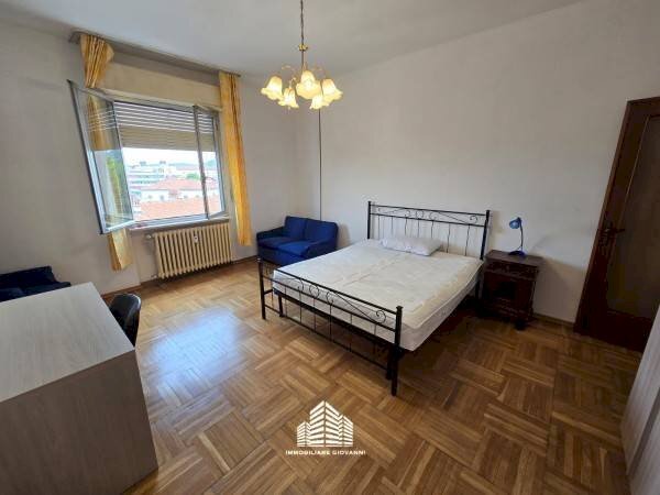 Camera da letto - Trilocale via Giovanni Piumati, 7, Bra - foto 1