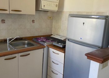 Interni appartamento - cucina a vista - Three-room apartment Via Monte Nero 26, Como - photo 10