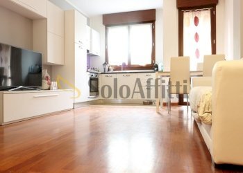 Soggiorno con cucina a vista - Two-room apartment viale Sant'aquilino, Varedo - photo 1