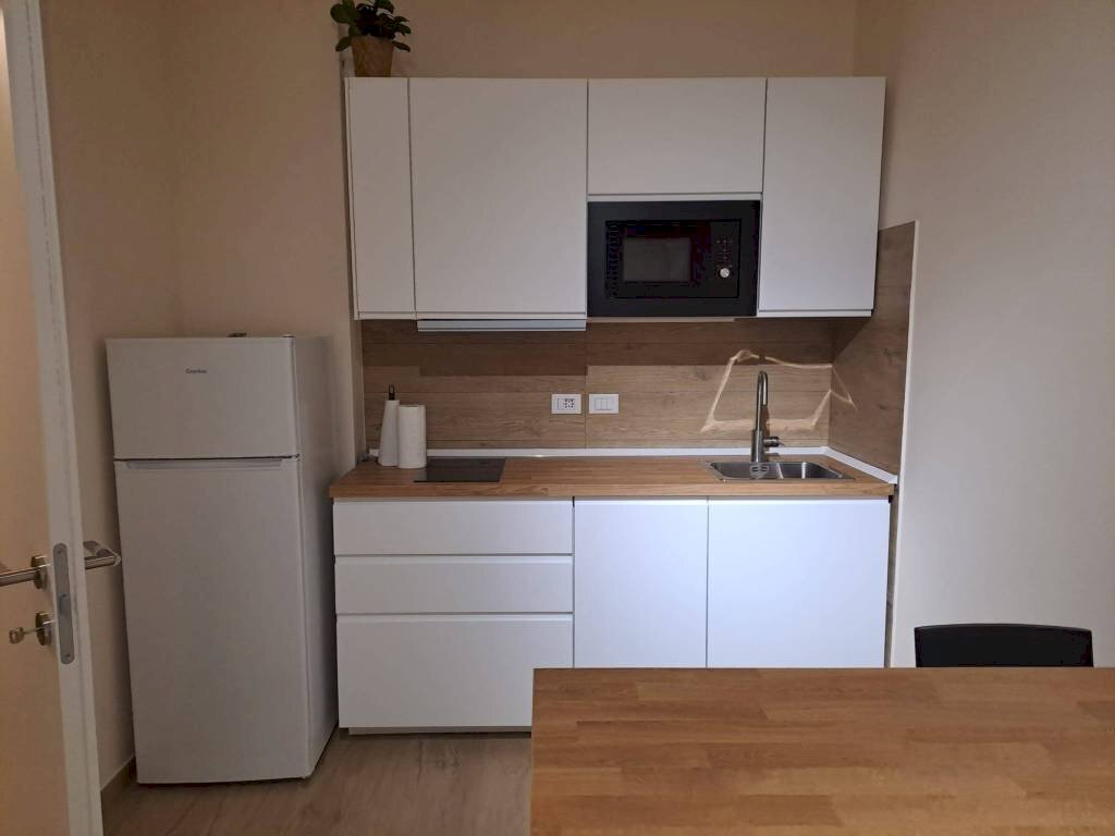 Cucina - Bilocale via San Felice, 94, Bologna (zona Centro Storico) - foto 1