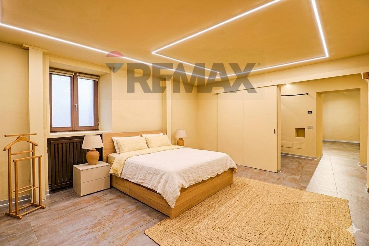 Camera / camera da letto - Two-room apartment via Felice Cavallotti
46, Luino - photo 2